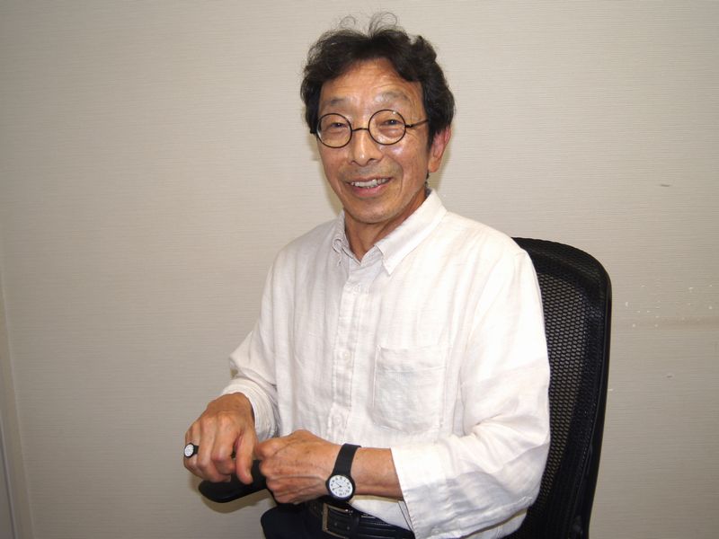 MQ-24-7B2とMQ-24-7B2のウオッチリングを着けた伊部菊雄氏